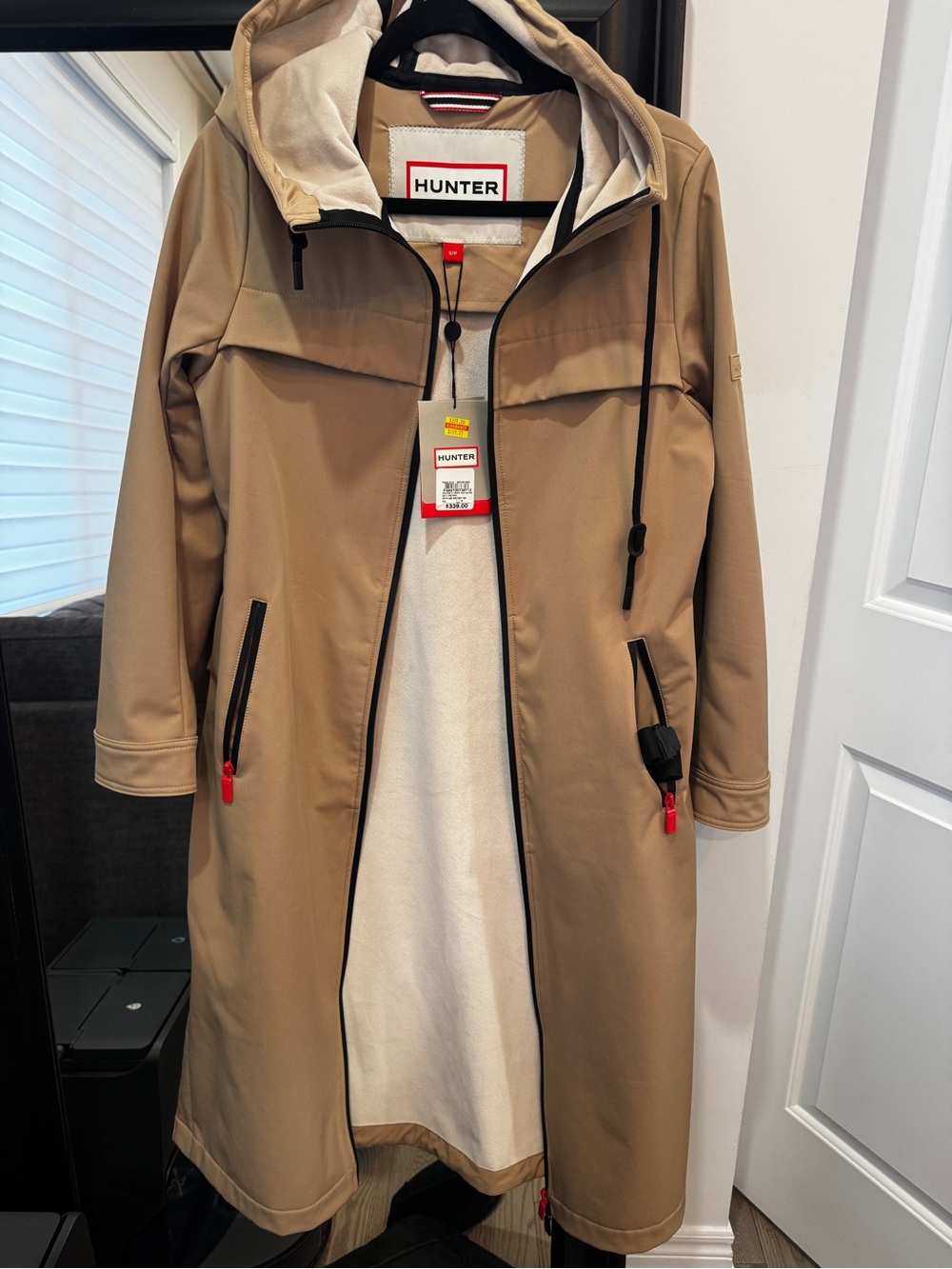 Hunter Beige Jacket with Black Trim and Red Accents